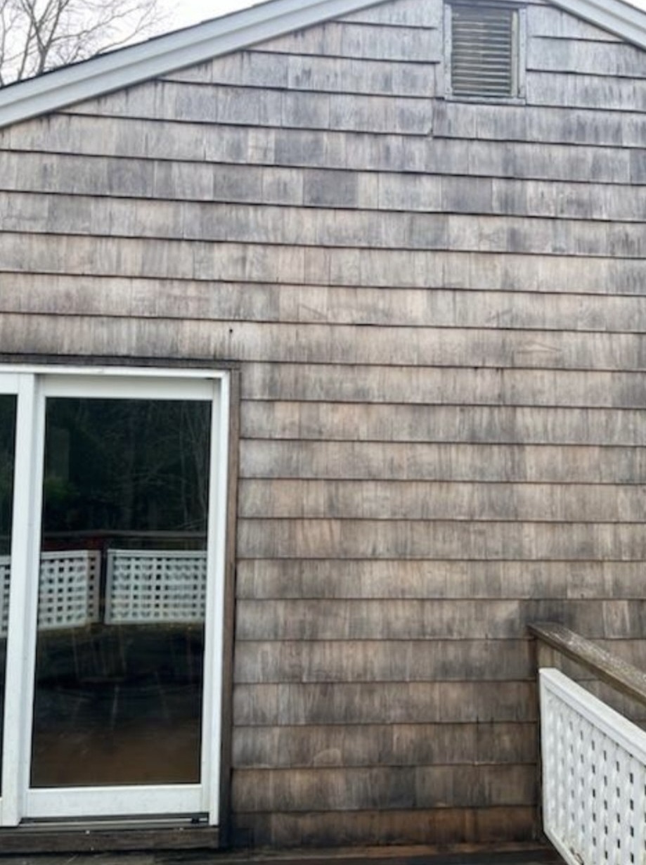 Cedar shake siding before cleaning Westerly RI - weathered and gray appearance