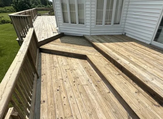 Deck and staircase after professional cleaning Charlestown RI - restored natural wood tones