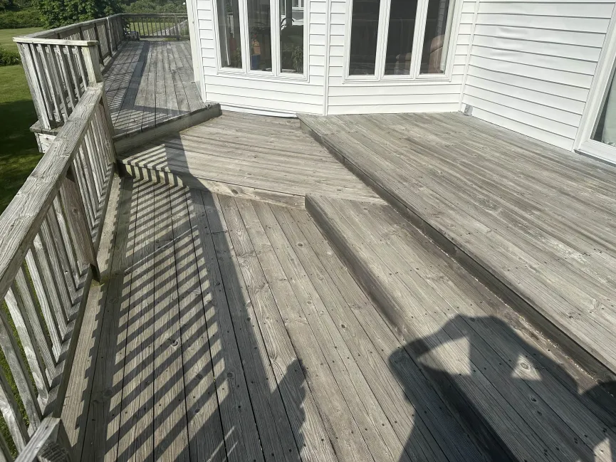 Deck and staircase before cleaning Charlestown RI - weathered gray wood appearance